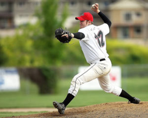 overhead throwing pitcher baseball